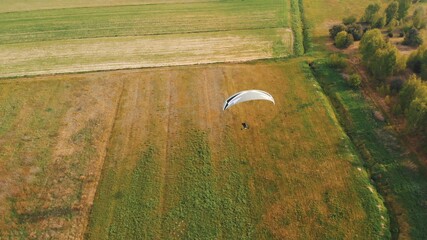 Paramotor Tandem Gliding And Flying In The Air. Copy space. High quality photo