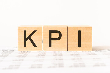 Word KPI, Key Performance Indicator, made with wood building blocks, stock image