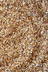 Toasted sesame seeds background