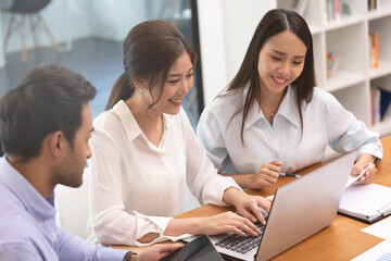 Asian business man and women meeting and talk about job in office.