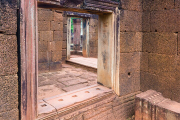 Fototapeta na wymiar Stone carvings at Banteay Srei temple area of Angkor in Siem Reap, Cambodia