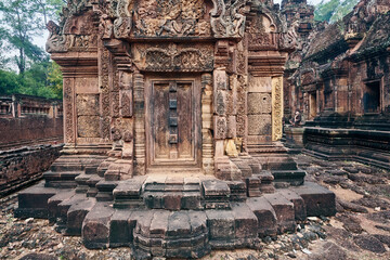 Fototapeta premium Stone carvings at Prasat Banteay Srei temple ruins, UNESCO World Heritage Site, Siem Reap Province, Cambodia