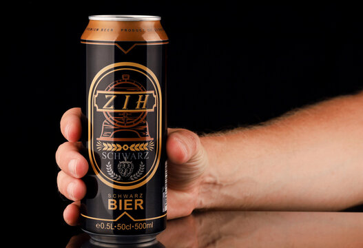 LVIV, UKRAINE - July 11, 2020: ZIH german beer in a jar in hand