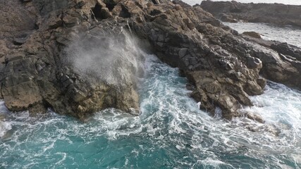 mighty ocean spitting out the cliffs