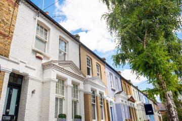 Attractive residential street of large terraced houses in Kensington & Chelsea borough of London 
