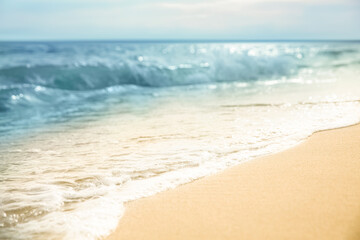 Beautiful sandy beach and sea on sunny day. Summer vacation