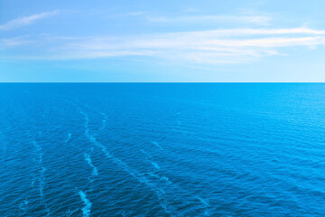 Beautiful ripply sea under blue sky with clouds