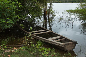 Wooden boat at the village Santa Clara near Puerto Narino at Amazonas river in Colombia
