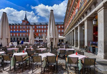 Plaza Mayor in Madrid, Spain. Plaza Mayor is a central plaza in the city of Madrid. Architecture...