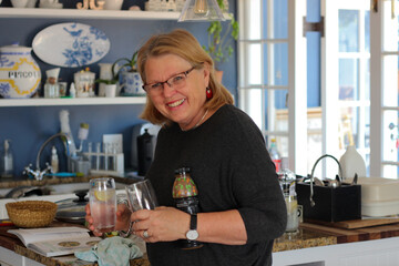 Fototapeta na wymiar senior woman in cafe with drinks