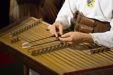A man emotionally plays the beautiful national instrument of the Cimbalom