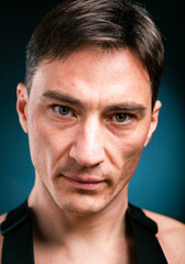 Fototapeta premium Close up vertical studio headshot portrait of young caucasian man stand look at camera posing, feel positive optimistic