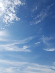 White clouds in blue sky.