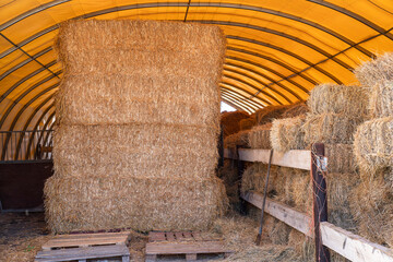 Hay bale storage in a farm building