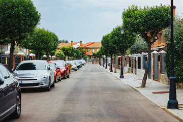 Quiet Spanish Residential Neighborhood with Cars Parked in the side