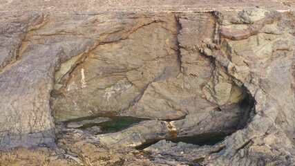 mighty ocean spitting out the cliffs