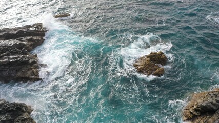 mighty ocean spitting out the cliffs
