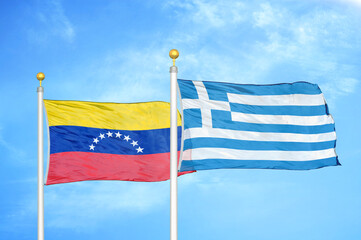 Venezuela and Greece two flags on flagpoles and blue sky