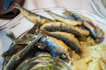 Grilled Sardines on a plate in a restaurant