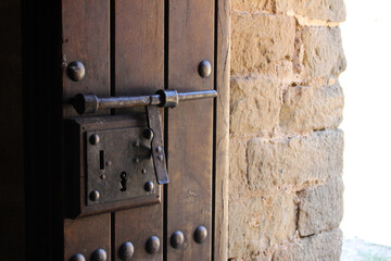 Old lock on an open door