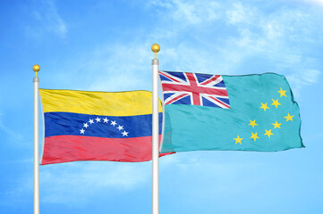 Venezuela and Tuvalu two flags on flagpoles and blue sky