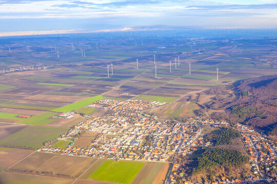 Sommerein town in Austria aerial view . District of Bruck an der Leitha in Lower Austria . View of Vienna suburb with windmills farm 