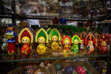 bright multi-colored wooden toys on the shelf