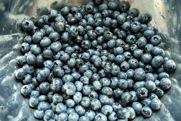 Fresh blackberries or blueberries photographed from above. Close up of fresh healthy summer berries. 