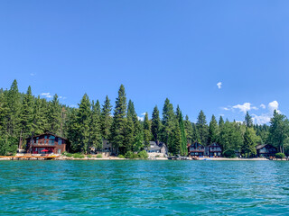 Fototapeta na wymiar View of the Lake Tahoe Shoreline from the Water, Clear Blue Water, Clear Day
