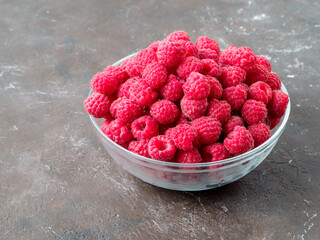 Fresh raspberry in the bowl.