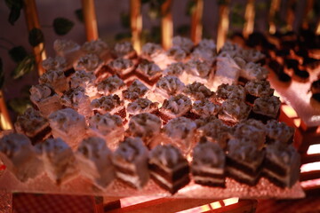 Indian reception wedding cake with roses and donuts.Beautiful wedding cake in Romantic styles.