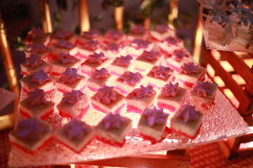Indian reception wedding cake with roses and donuts.Beautiful wedding cake in Romantic styles.