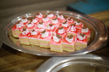 Indian reception wedding cake with roses and donuts.Beautiful wedding cake in Romantic styles.