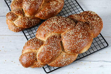 Challah. Braided bread with sesame seeds.