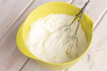 Whipped by mixer egg whites with sugar