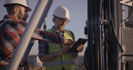 Engineers working on 5g antenna