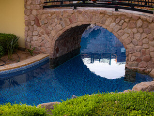 Swimming pool on hotel, Swimming pool at daylight, Bridge over swimming pool