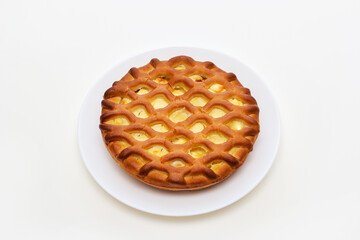 cheesecake on a plate on a white background, baking for tea