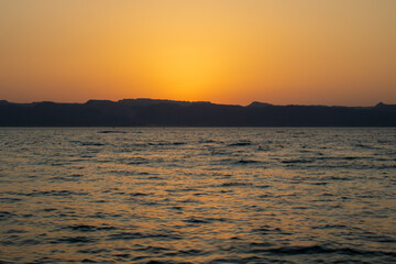 Sunset on beach, orang sky on beach 