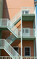 external metal staircase on the facade of the building. Emergency exit