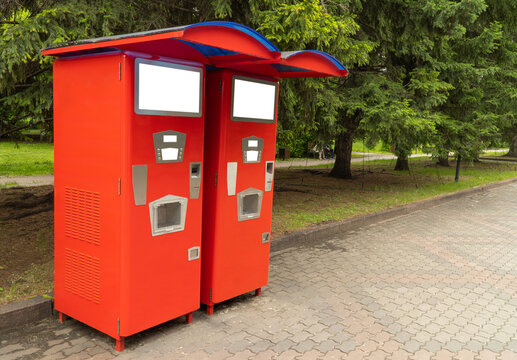 machine for drinking sparkling water installed on the street. vintage automat for making soda. Beverage vending machines selling. Red soda vending machine. copy space.