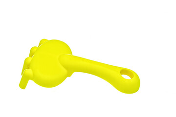 Beach toys: a rake for sand on a white background