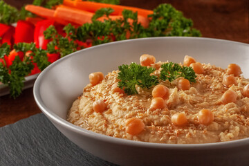 Healthy Homemade Creamy Hummus with Olive Oil and Pita Chips