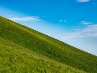 Landscape of a green hill and the sky