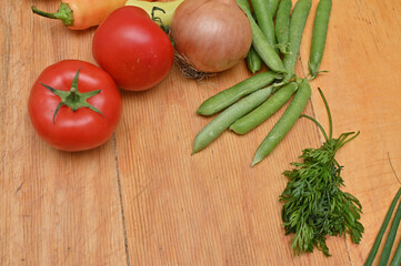 pille of vegetables on wooden table 