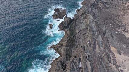 Fototapeta na wymiar mighty ocean spitting out the cliffs