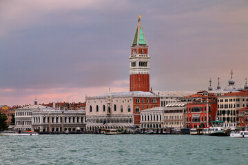 View of San Marco Campanile, Palazzo Ducale and Biblioteca at sunset in Venice, Italy
