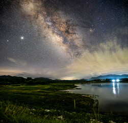 At night have stars, milky way and galaxies filled the dark sky.