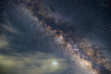 At night have stars, milky way and galaxies filled the dark sky.