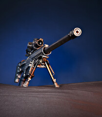 Dramatic blue lighting on background of a Sniper rifle, shot in studio.